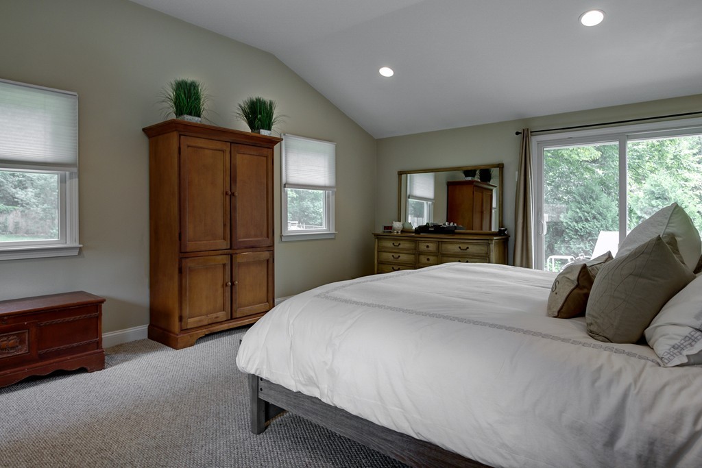 12 Amy Road Framingham, MA 01701 - Photo 14 of 30 a bedroom with a bed dresser and a window