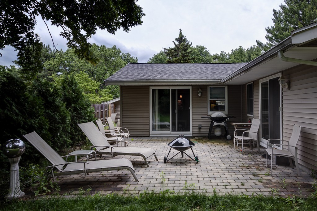 12 Amy Road Framingham, MA 01701 - Photo 27 of 30 a view of backyard with seating space and wooden fence
