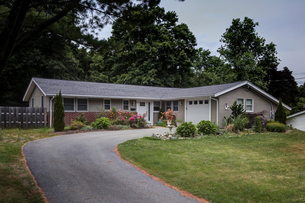 12 Amy Road Framingham, MA 01701 - Photo 30 of 30 a front view of a house with a yard and porch