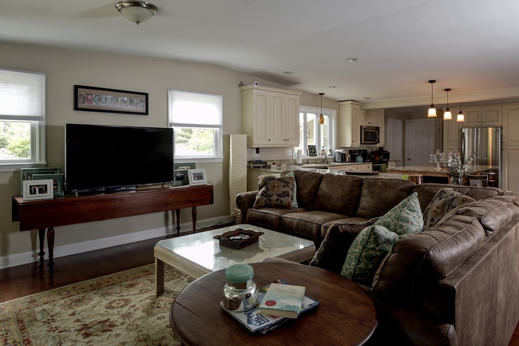 12 Amy Road Framingham, MA 01701 - Photo 9 of 30 a living room with furniture and a flat screen tv