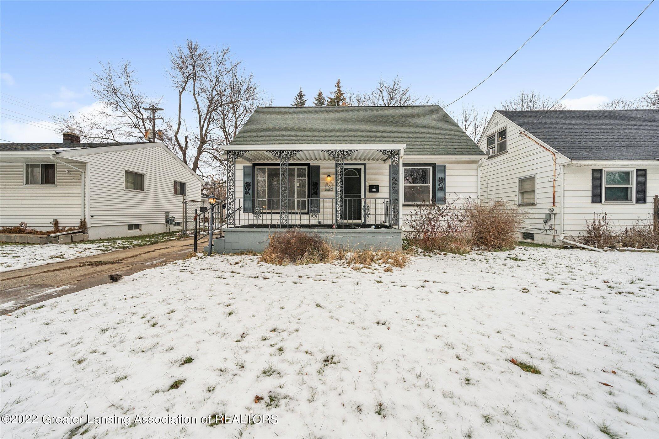 519 East Cavanaugh Road Lansing, MI 48910 - Photo 3 of 34 03-519-E-Cavanaugh-Rd-WindowStill-Real-E