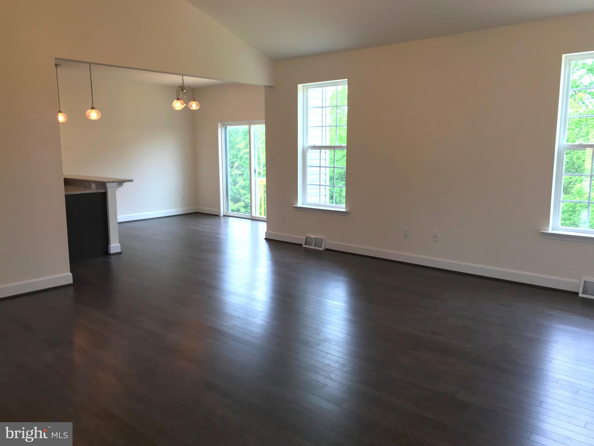 860 Ripple Drive, Unit 76 Hanover, PA 17331 - Photo 7 of 16 Open family room to kitchen/breakfast, hardwoods