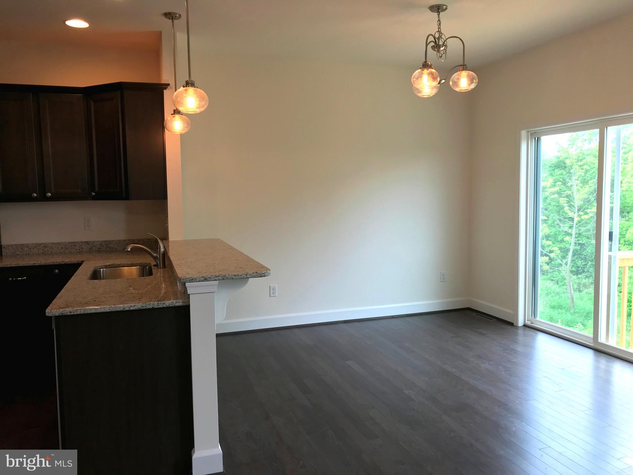 860 Ripple Drive, Unit 76 Hanover, PA 17331 - Photo 10 of 16 Breakfast-hardwood floors and upgraded lighting