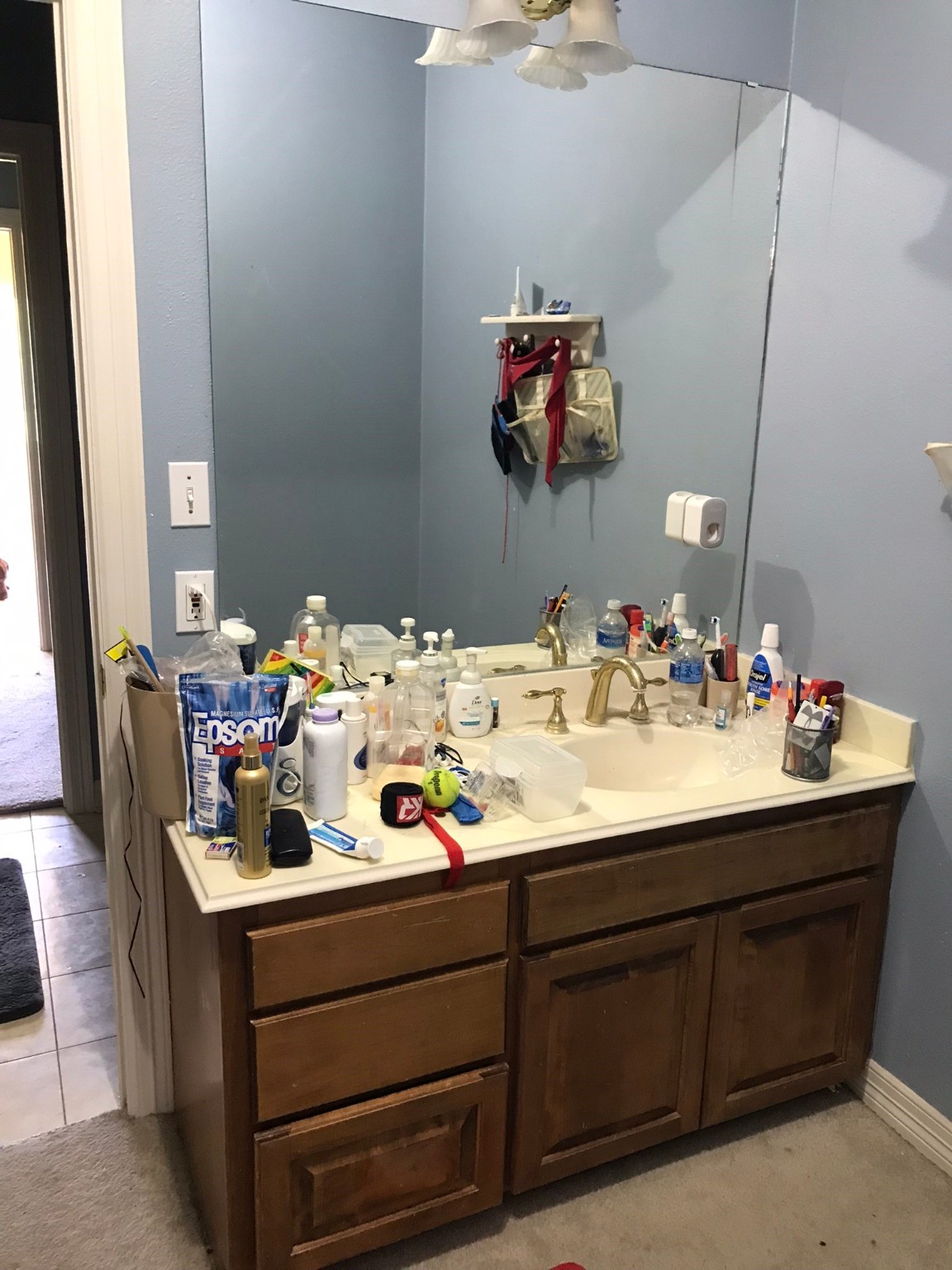 1616 Milian Circle Sweeny, TX 77480 - Photo 32 of 49 a bathroom with a sink and a mirror