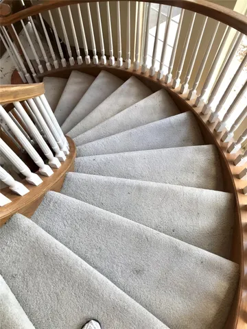a view of a swimming pool with an outdoor space and seating area