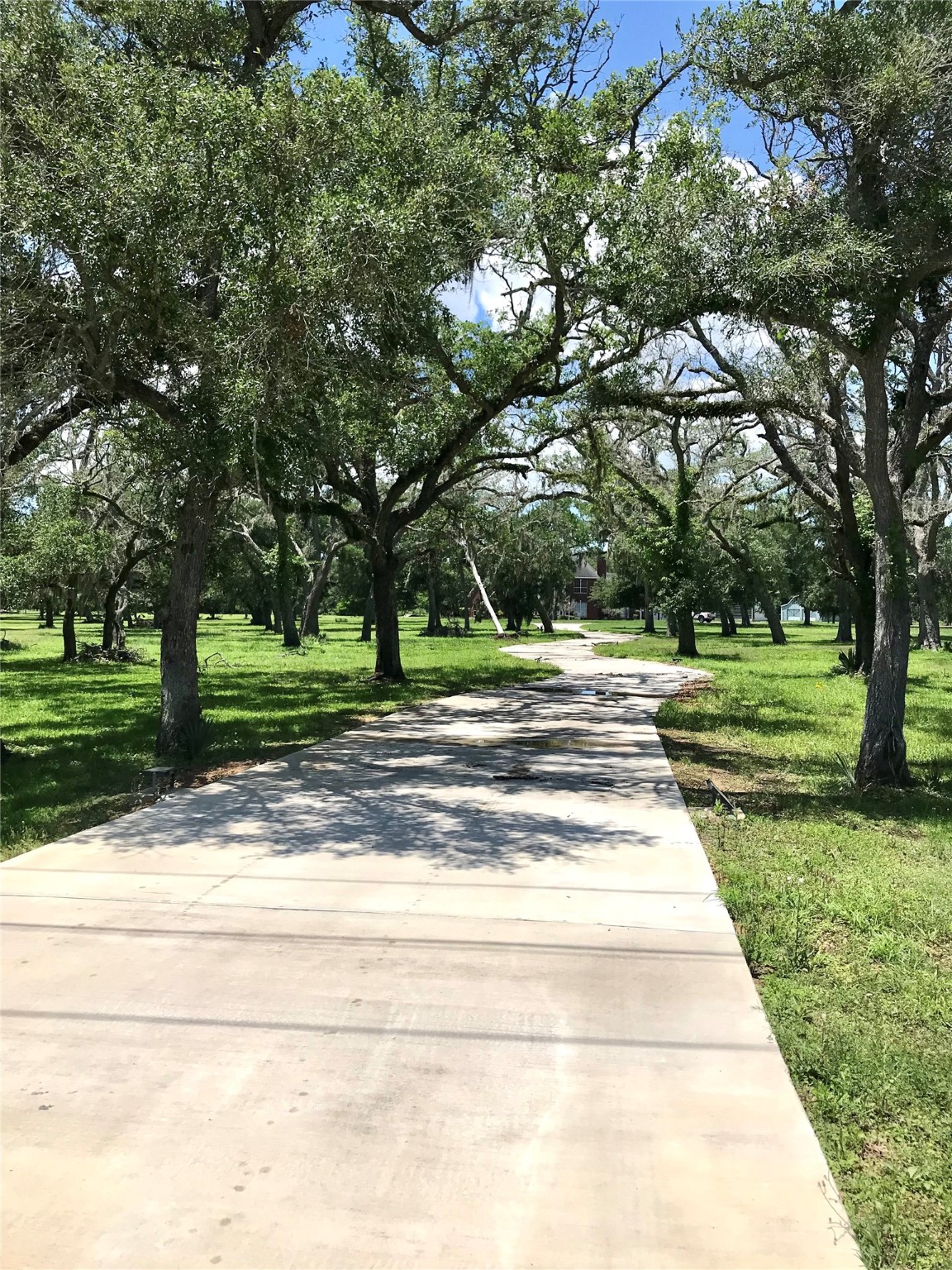 1616 Milian Circle Sweeny, TX 77480 - Photo 48 of 49 THE DRIVE TO AND FROM THE MAIN ROAD AT FM1459 AND THE HOUSE