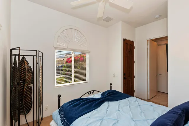 a view of a backyard with sitting area