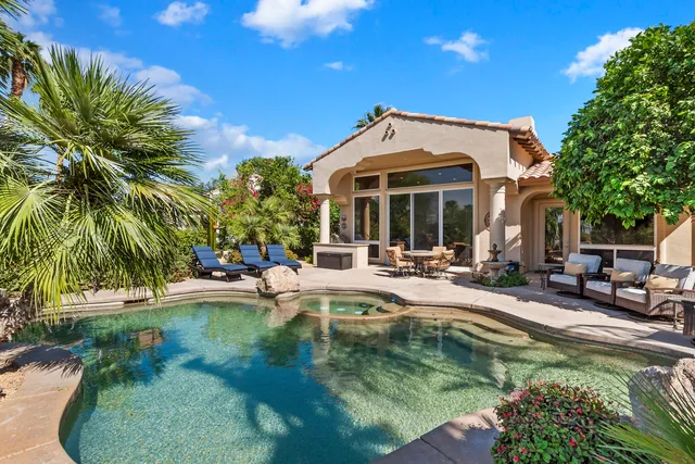 a utility room with sink dryer and washer