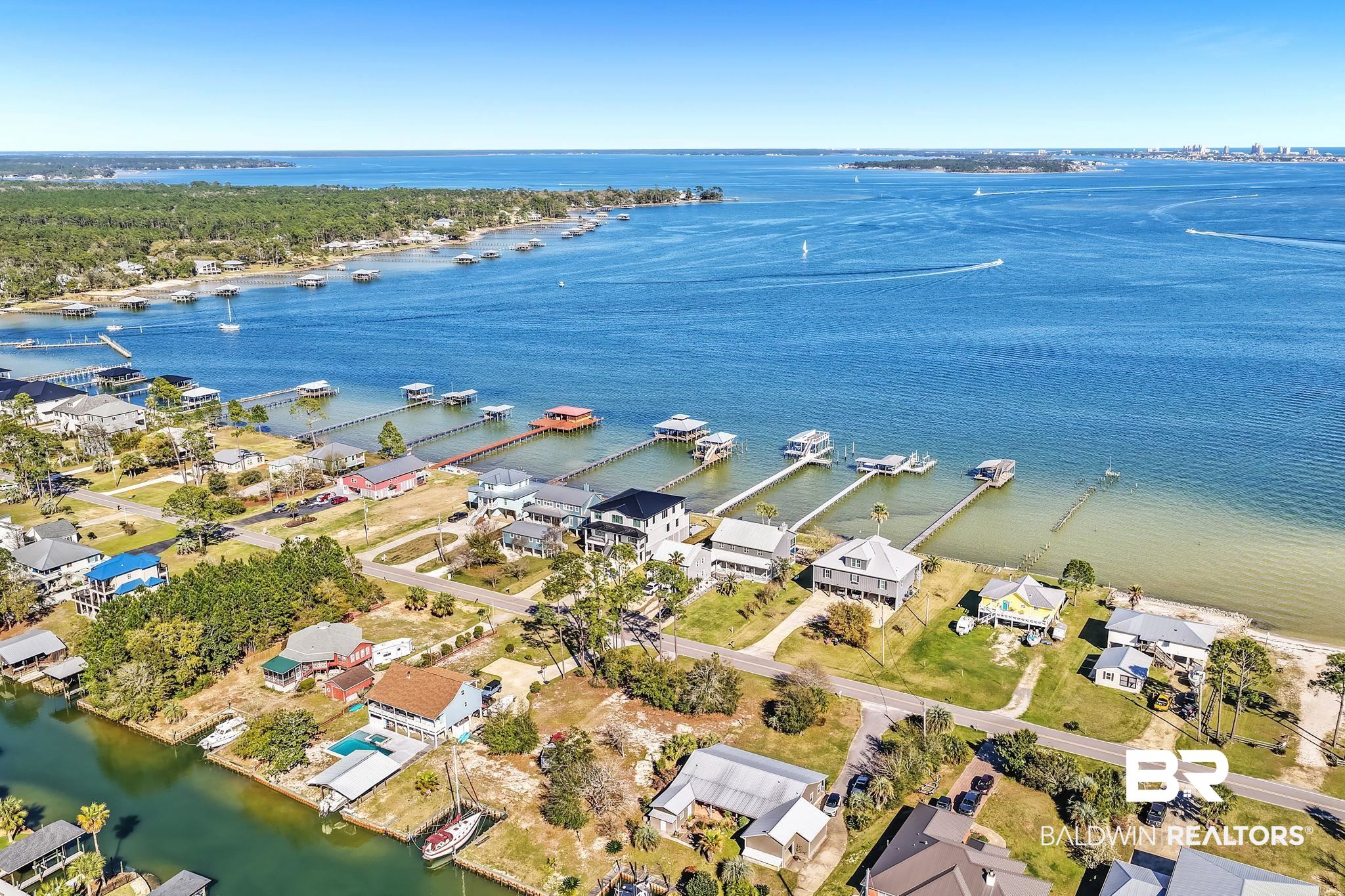 6434 County Road 95 Elberta, AL 36530 - Photo 91 of 99 Aerial perspective of suburban area with a large body of water