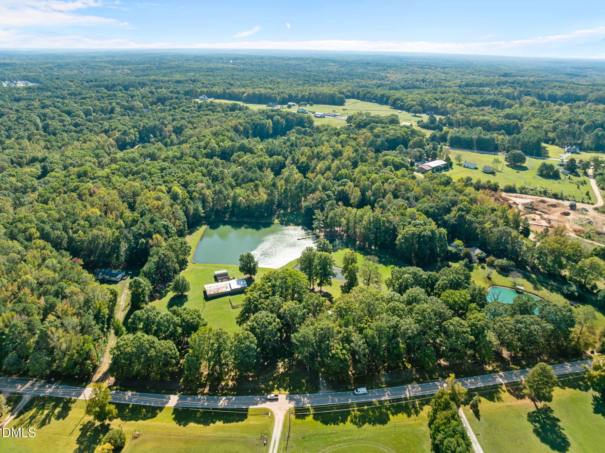 917 John Mitchell Road Youngsville, NC 27596 - Photo 4 of 16 a view of a city with a houses