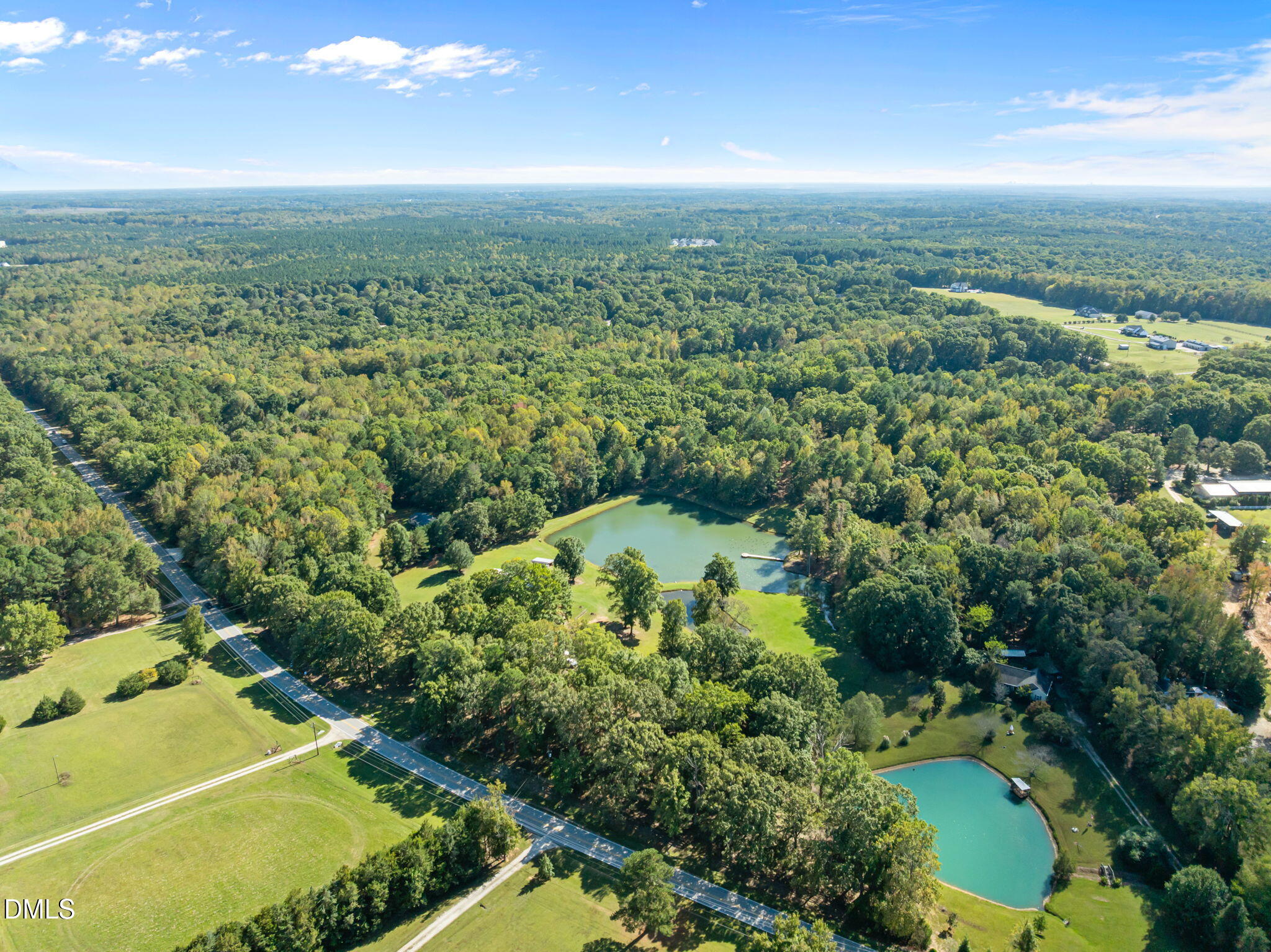 917 John Mitchell Road Youngsville, NC 27596 - Photo 5 of 16 a view of a city