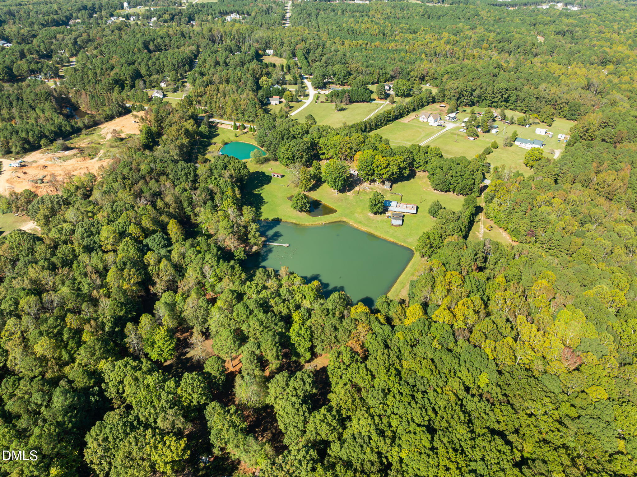 917 John Mitchell Road Youngsville, NC 27596 - Photo 9 of 16 a view of a yard
