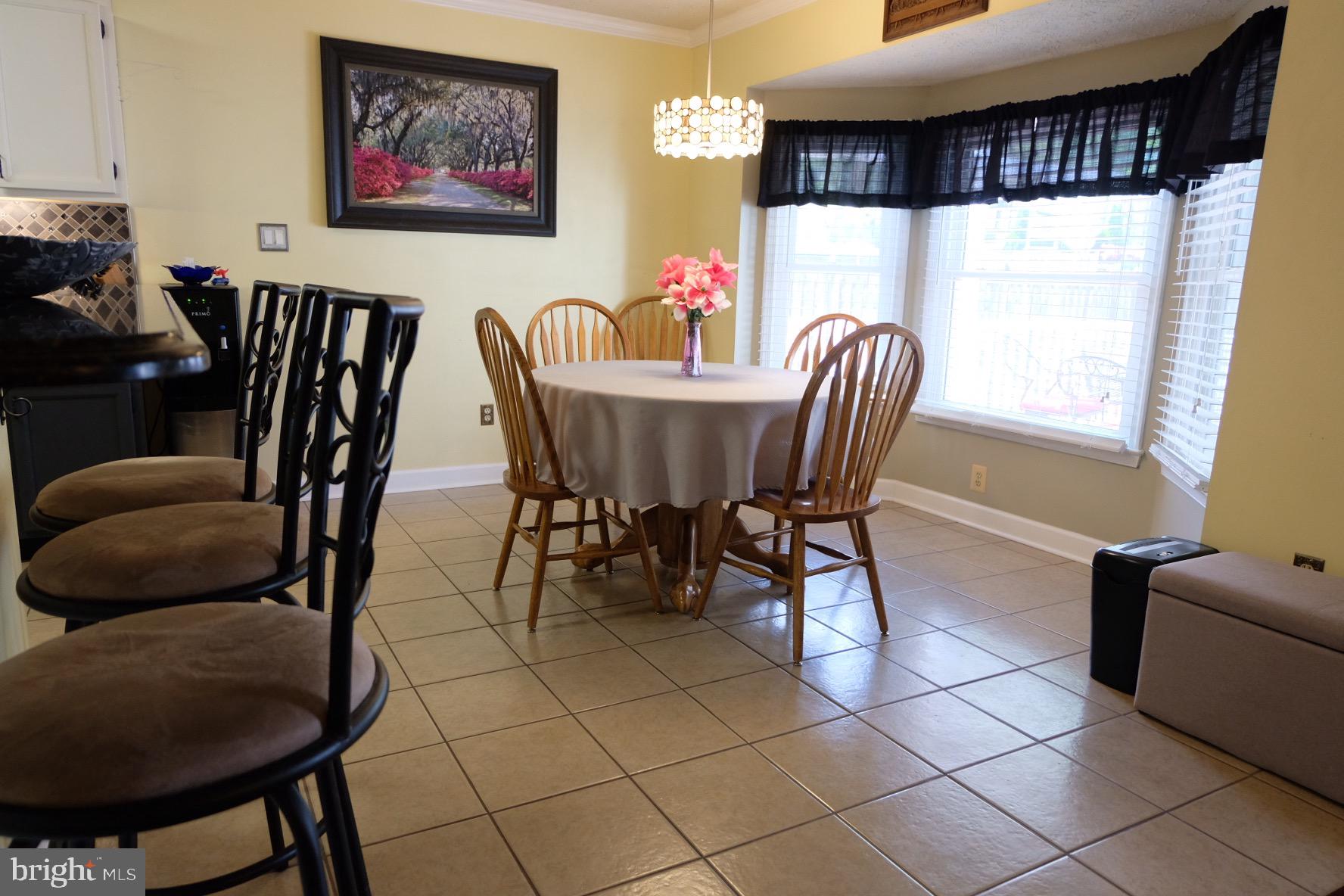 1000 Elbridge Way Severn, MD 21144 - Photo 11 of 32 Open dining space with large bay windows