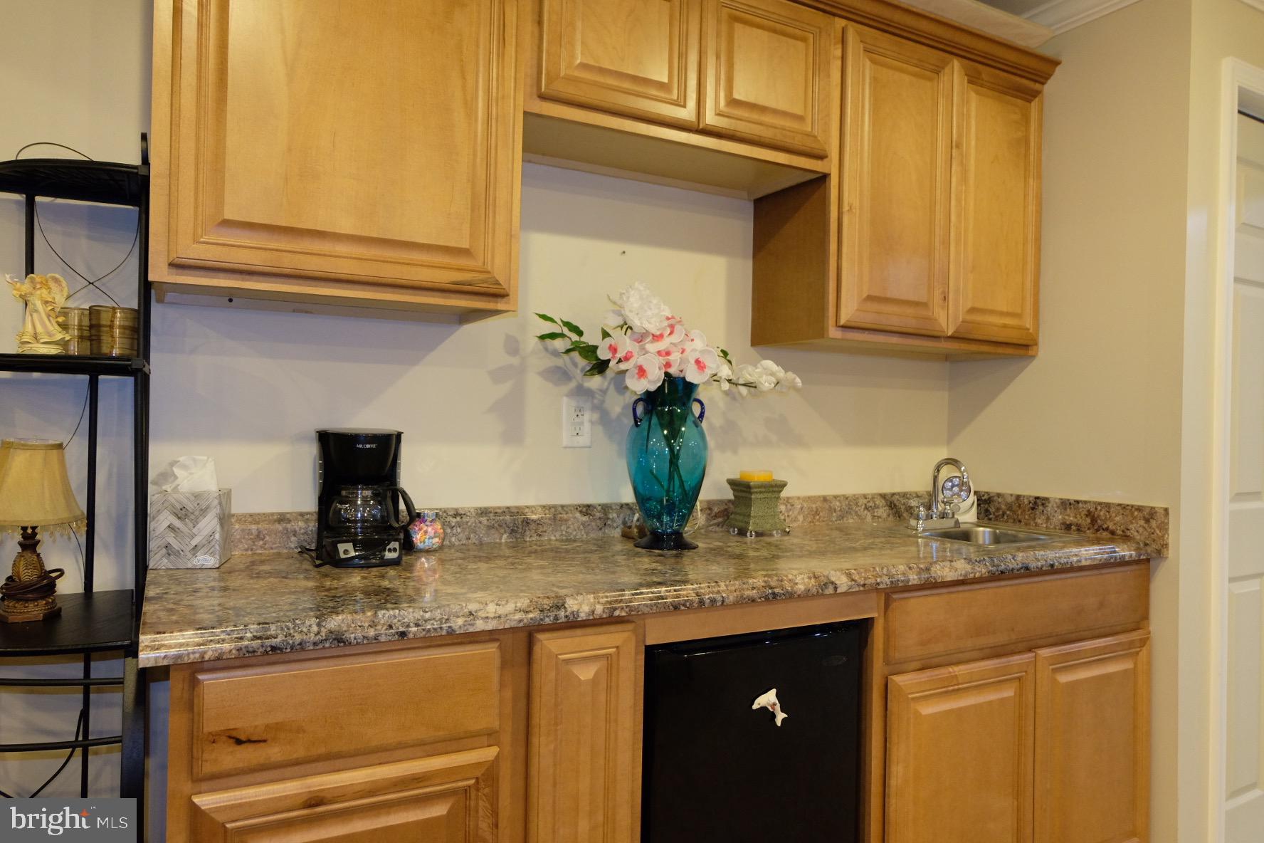 1000 Elbridge Way Severn, MD 21144 - Photo 26 of 32 Your basement comes with a wet bar