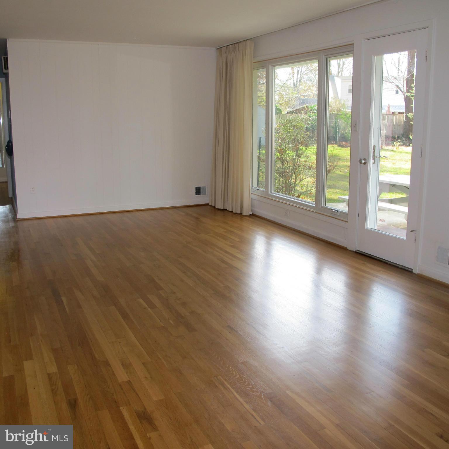 305 Cavalier Court Silver Spring, MD 20901 - Photo 6 of 30 Living Room with gleaming wood floors