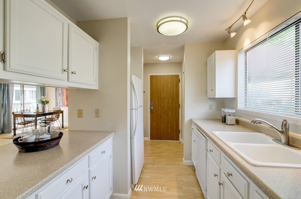 555 Prospect Street, Unit 3 Seattle, WA 98109 - Photo 13 of 23 a bathroom with a sink and a mirror
