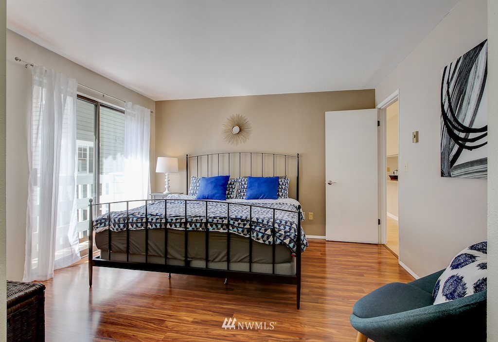 555 Prospect Street, Unit 3 Seattle, WA 98109 - Photo 15 of 23 a view of a bedroom with furniture and wooden floor