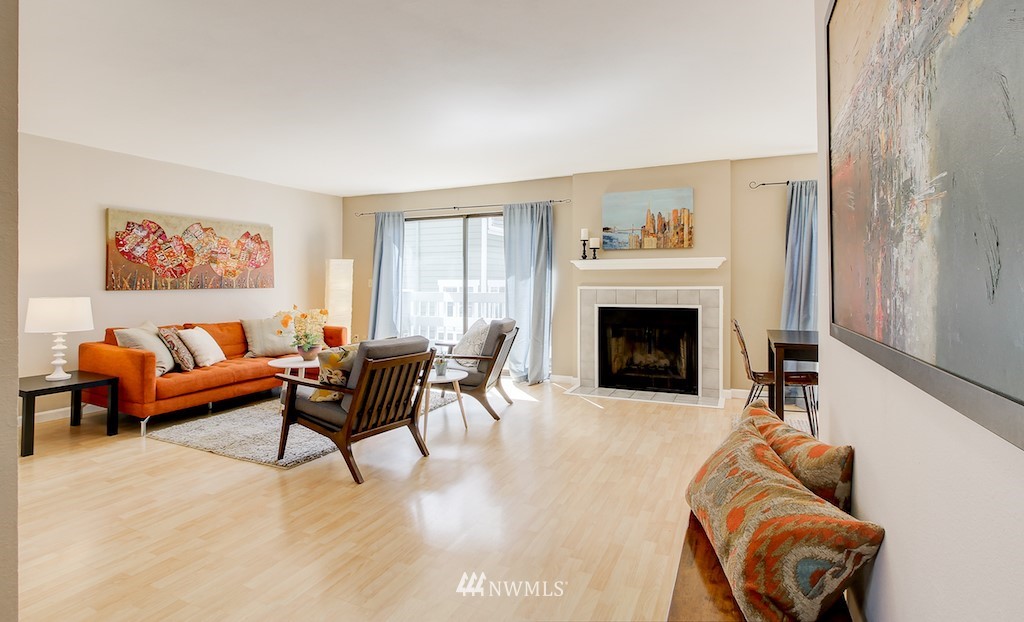 555 Prospect Street, Unit 3 Seattle, WA 98109 - Photo 3 of 23 a living room with furniture and a fireplace