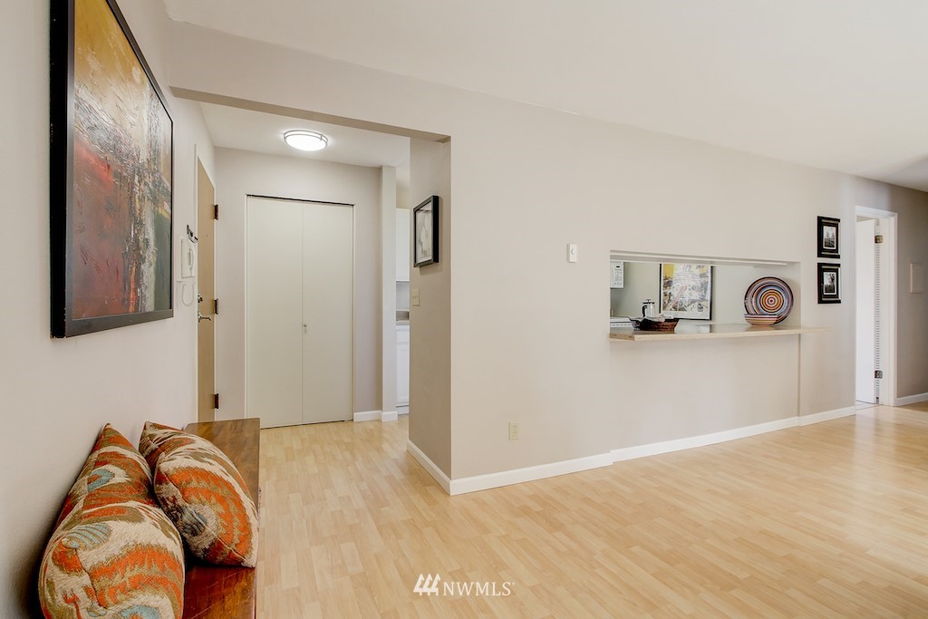 555 Prospect Street, Unit 3 Seattle, WA 98109 - Photo 21 of 23 a view of a bedroom with bed and couch