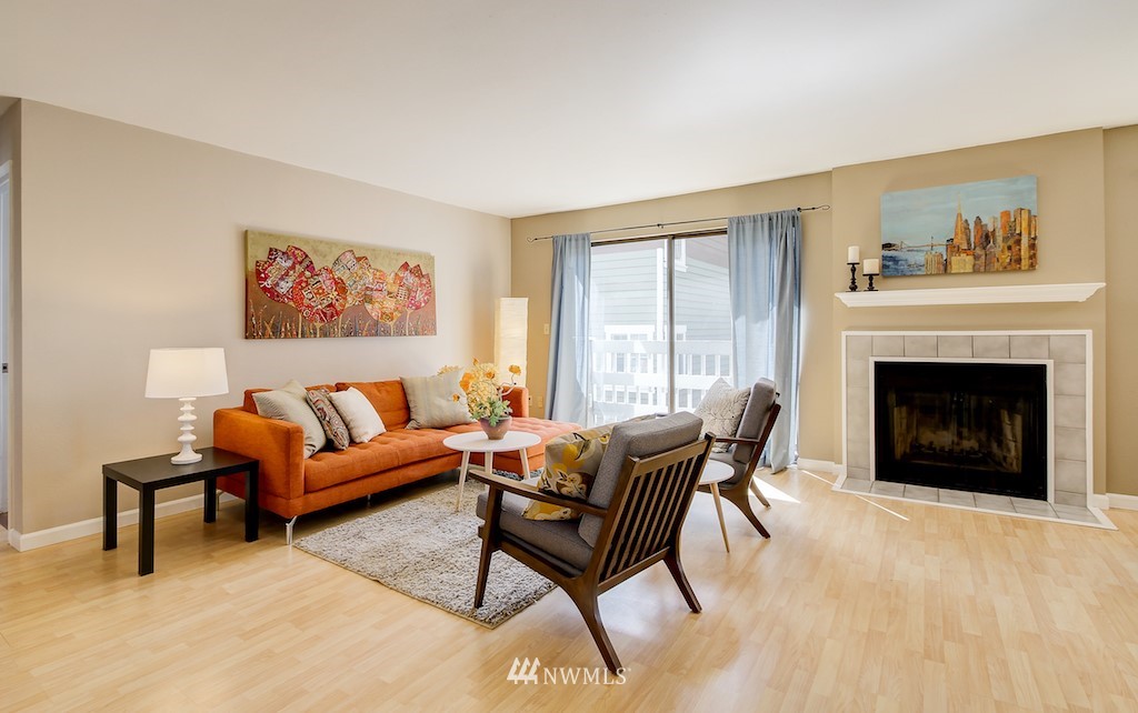 555 Prospect Street, Unit 3 Seattle, WA 98109 - Photo 7 of 23 a living room with furniture and a fireplace
