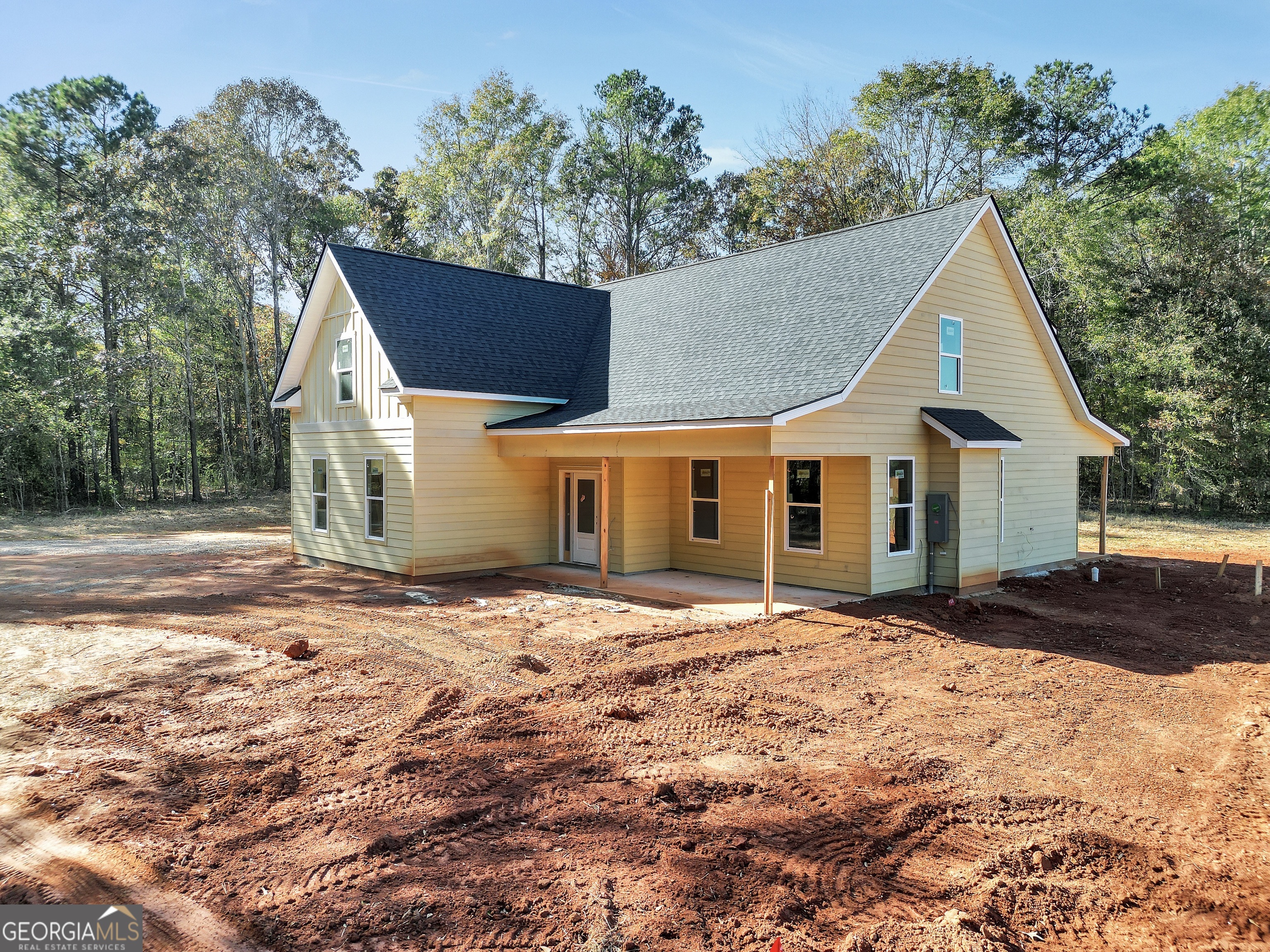51 Oak Road Locust Grove, GA 30248 - Photo 2 of 8 a front view of a house with a yard
