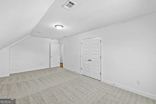 an empty room with closet