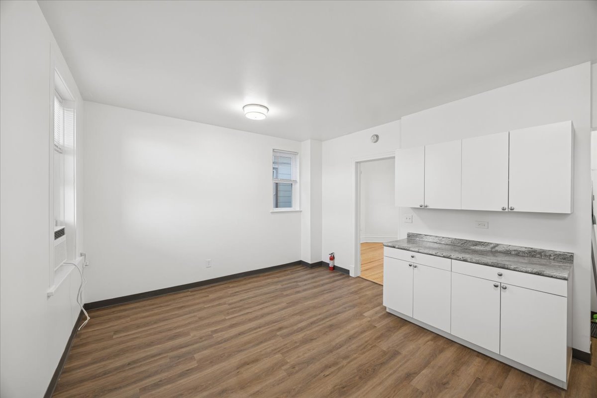 3 East Quincy Street, Unit 2 Riverside, IL 60546 - Photo 17 of 21 a view of a kitchen with wooden floor