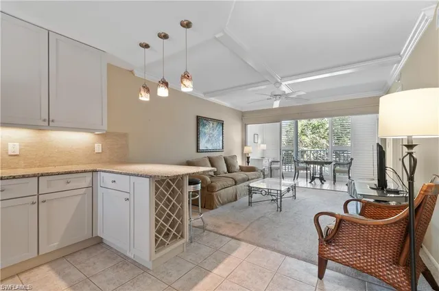 a bathroom with a sink a toilet a mirror and vanity