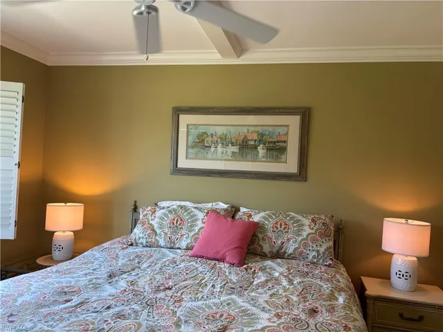 a open kitchen with a sink dining table and chairs