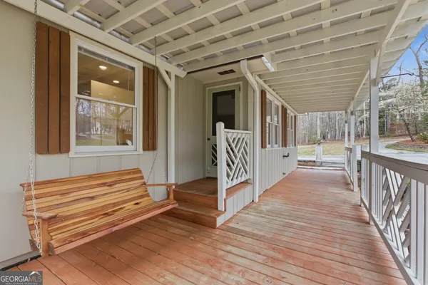 a kitchen with stainless steel appliances granite countertop a stove a refrigerator and a cabinets