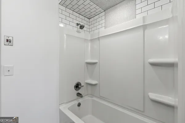 an aerial view of a house with outdoor space