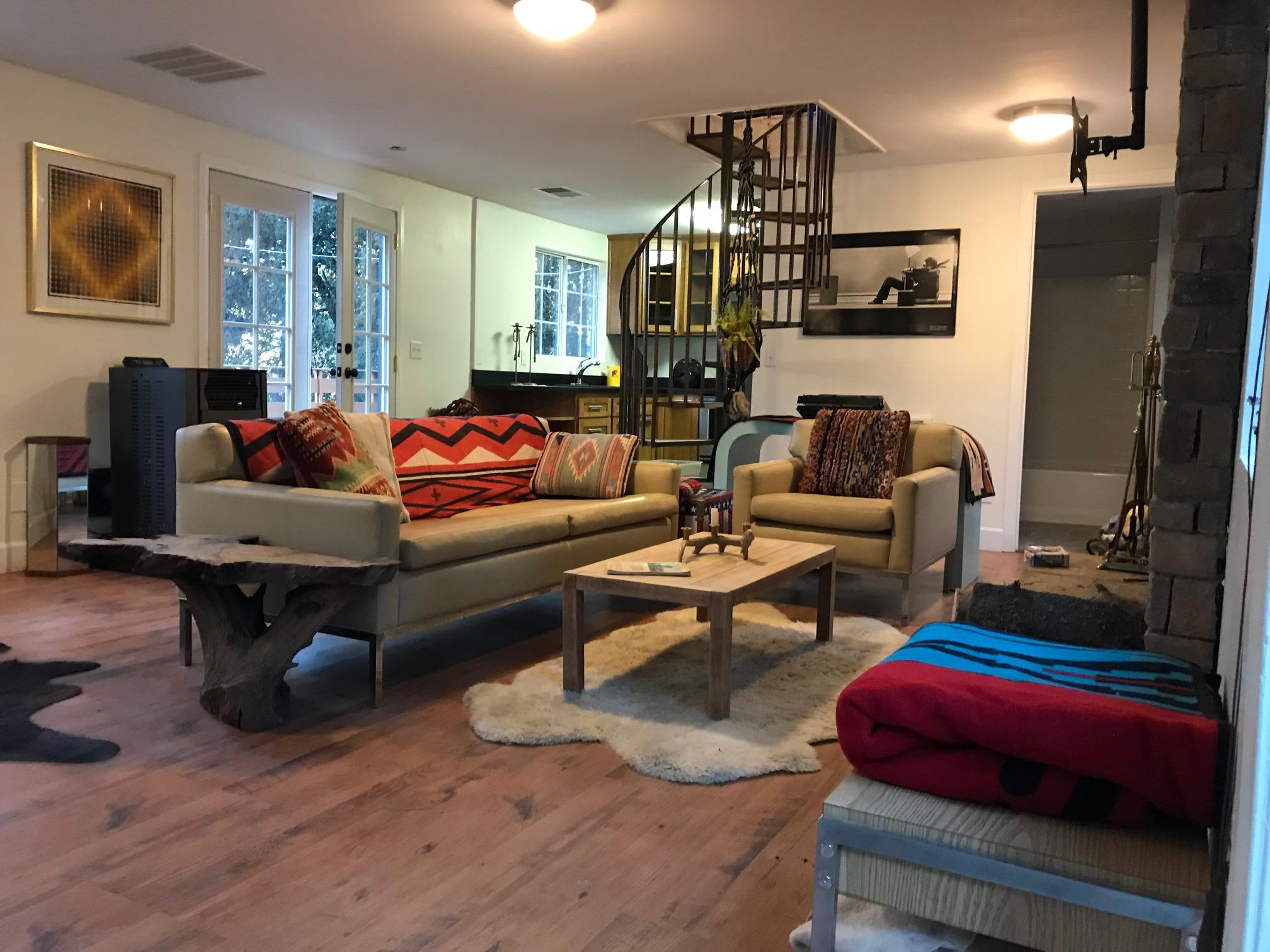 52760 Pine Ridge Road Idyllwild, CA 92549 - Photo 11 of 41 a living room with furniture and a flat screen tv