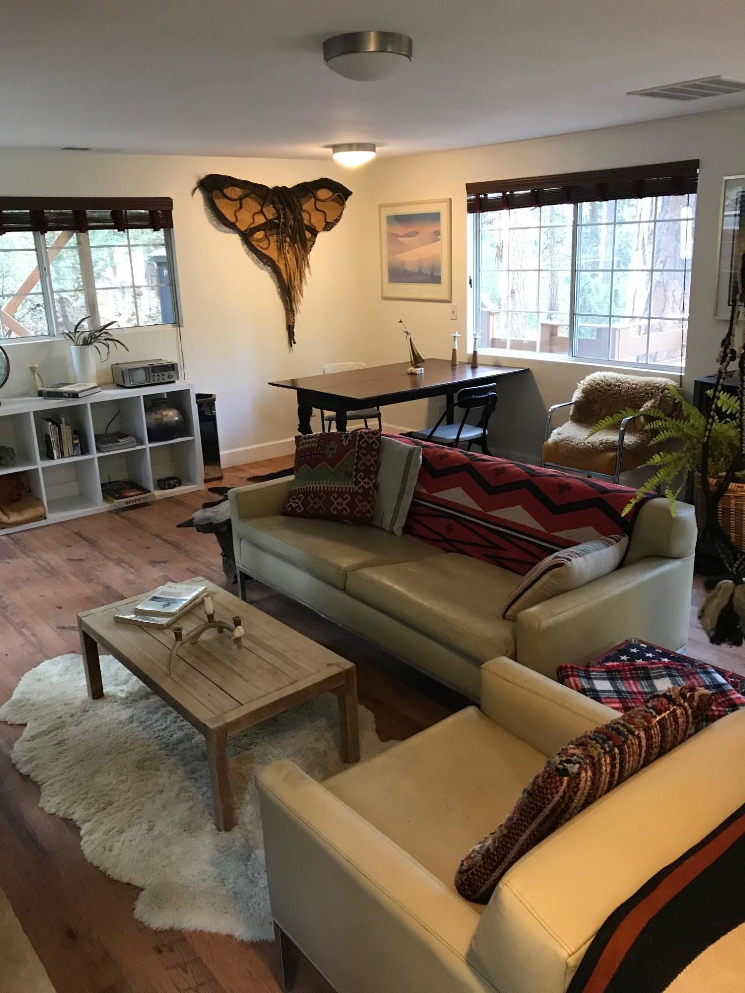 52760 Pine Ridge Road Idyllwild, CA 92549 - Photo 17 of 41 a living room with furniture and a window