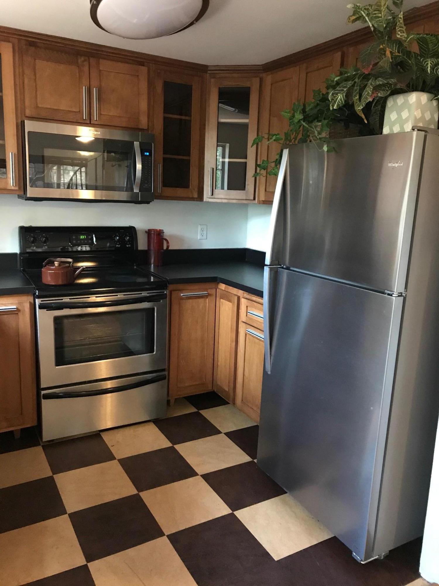 52760 Pine Ridge Road Idyllwild, CA 92549 - Photo 20 of 41 a kitchen with granite countertop stainless steel appliances and a sink