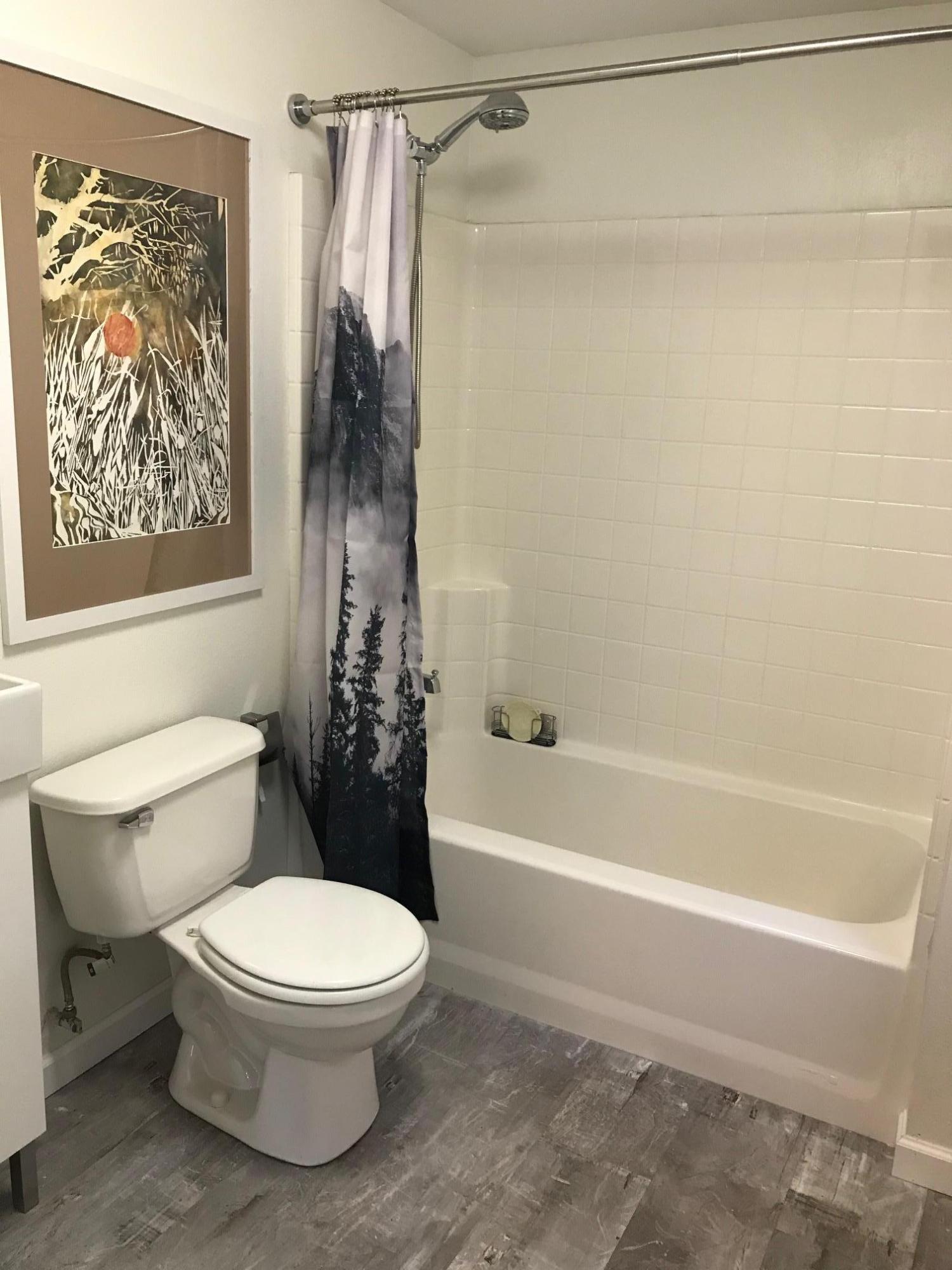 52760 Pine Ridge Road Idyllwild, CA 92549 - Photo 23 of 41 a bathroom with a toilet and a shower