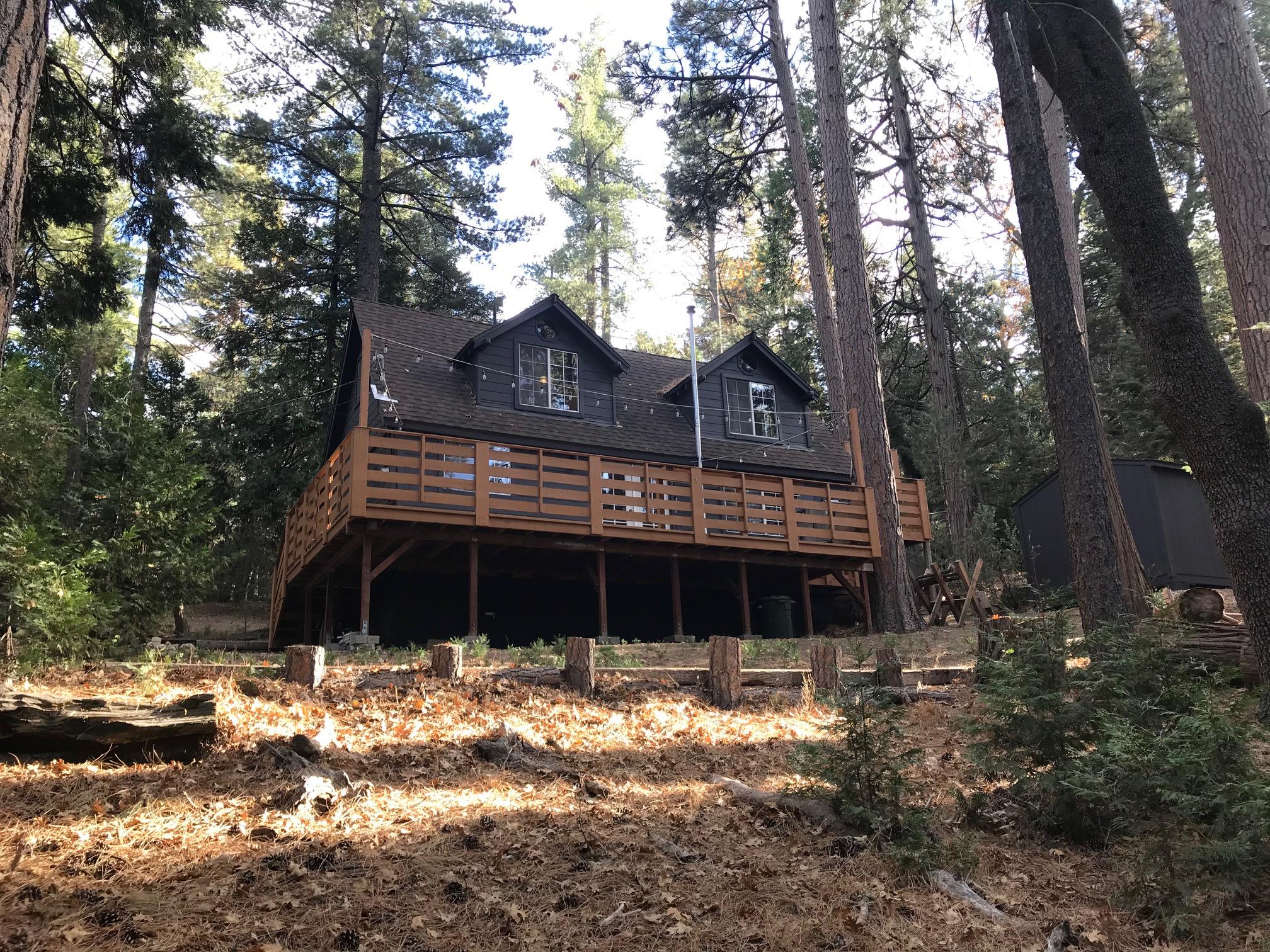 52760 Pine Ridge Road Idyllwild, CA 92549 - Photo 7 of 41 a front view of a house with a yard