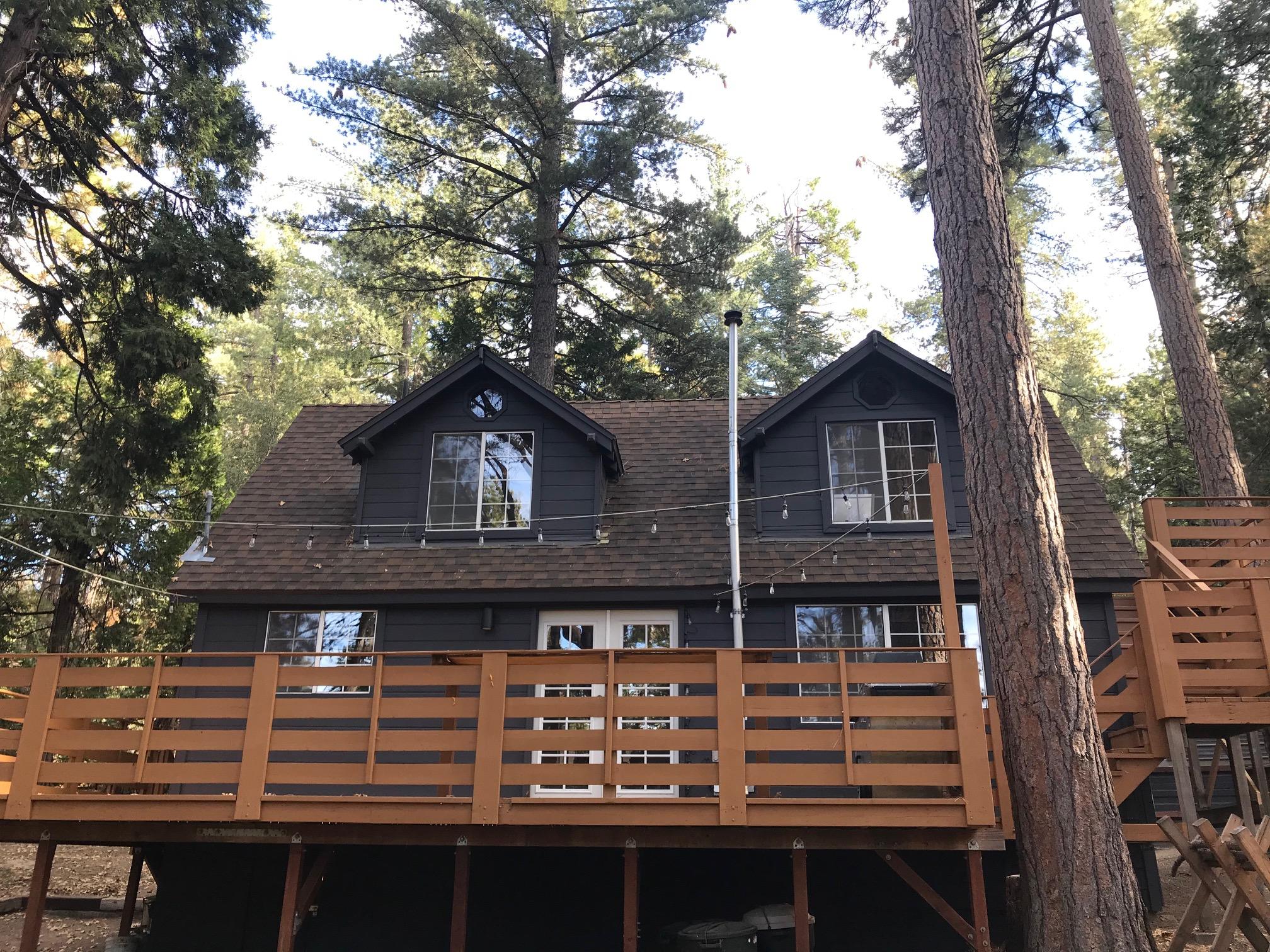 52760 Pine Ridge Road Idyllwild, CA 92549 - Photo 8 of 41 a front view of a house with balcony