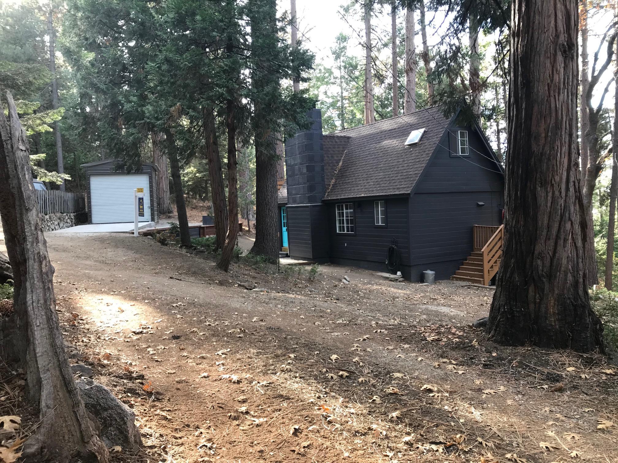 52760 Pine Ridge Road Idyllwild, CA 92549 - Photo 10 of 41 a backyard of a house with lots of green space