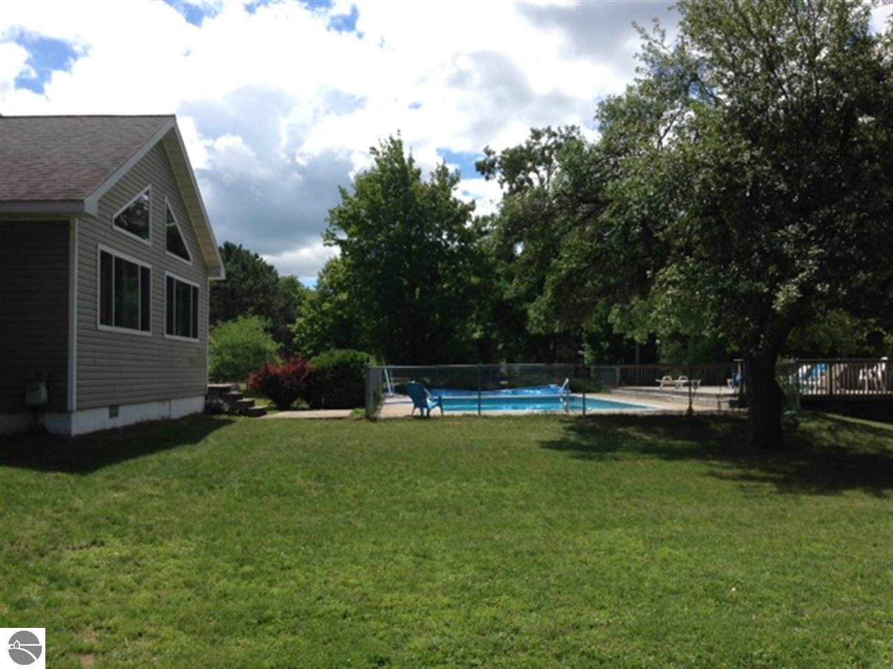 3870 East Duck Lake Road Grawn, MI 49637 - Photo 2 of 5 1780209-1.JPG