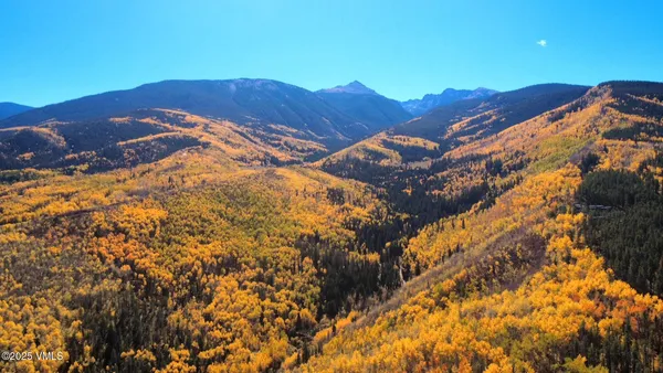 a view of mountain view with mountains in the background