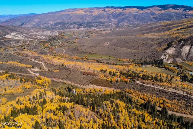 a view of mountain view with mountains in the background