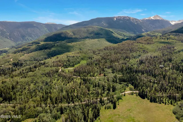 a view of ocean and a building