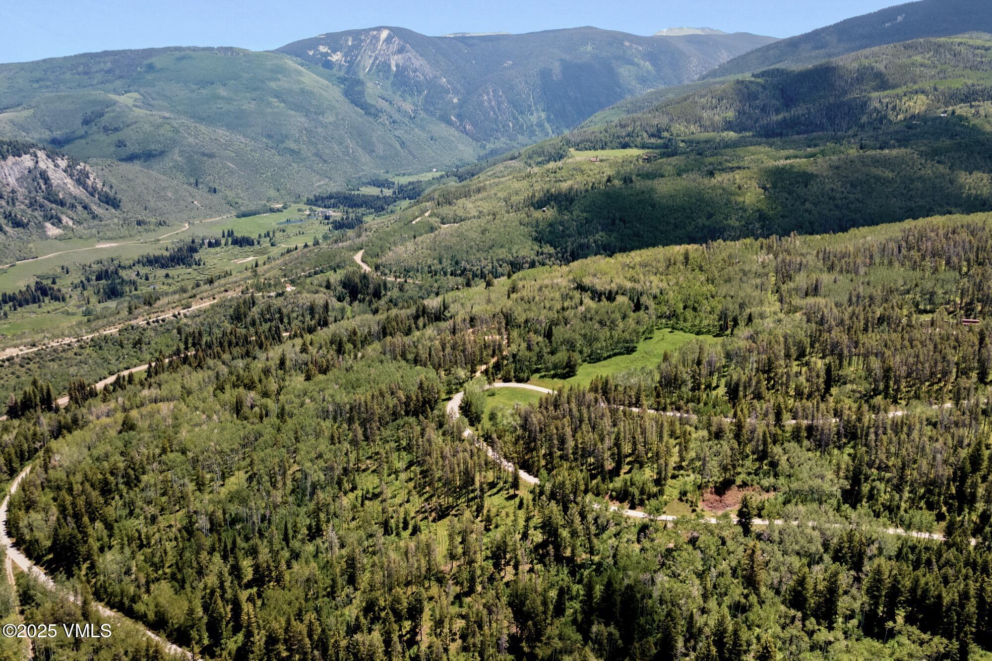 Tbd Casteel Creek Road Edwards, CO 81632 - Photo 33 of 36 a view of a lush green hillside and a mountain