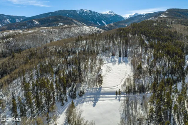 a view of a tree in front of a building