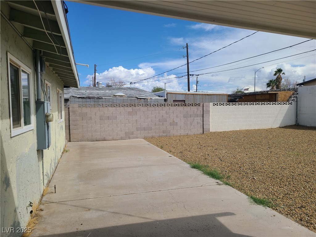 129 Maple Street Henderson, NV 89015 - Photo 19 of 28 Here is your covered patio and a LARGE yard!