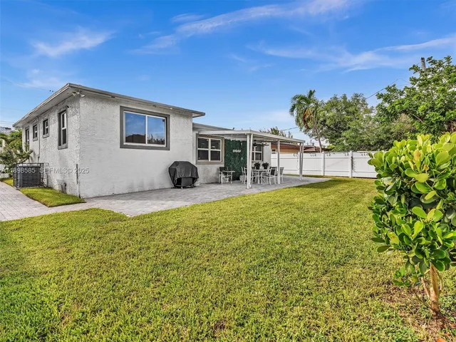 a bathroom with a sink a bathtub and a shower