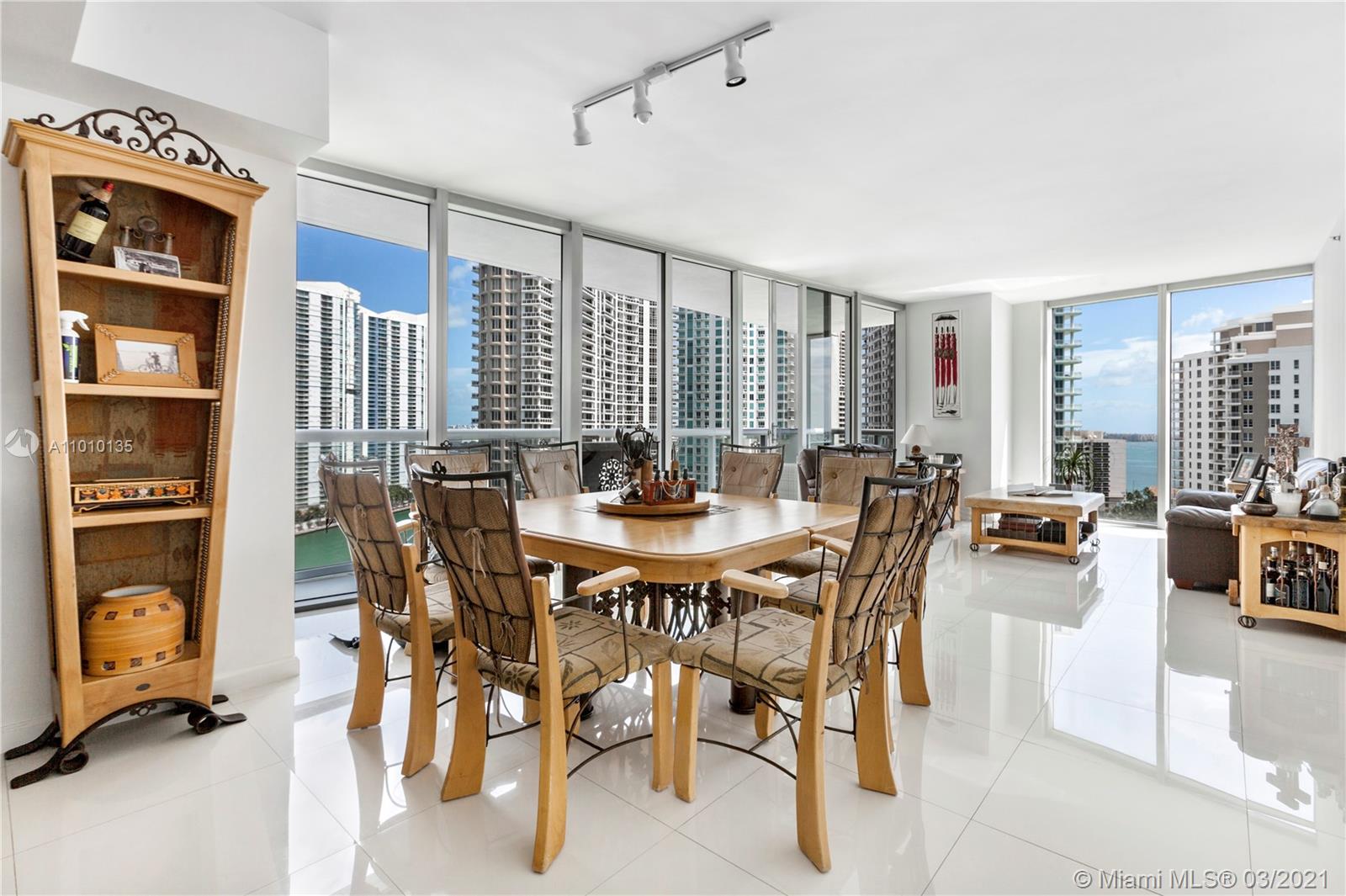 495 Brickell Avenue, Unit 1802 Miami, FL 33131 - Photo 4 of 29 a view of a dining room with furniture
