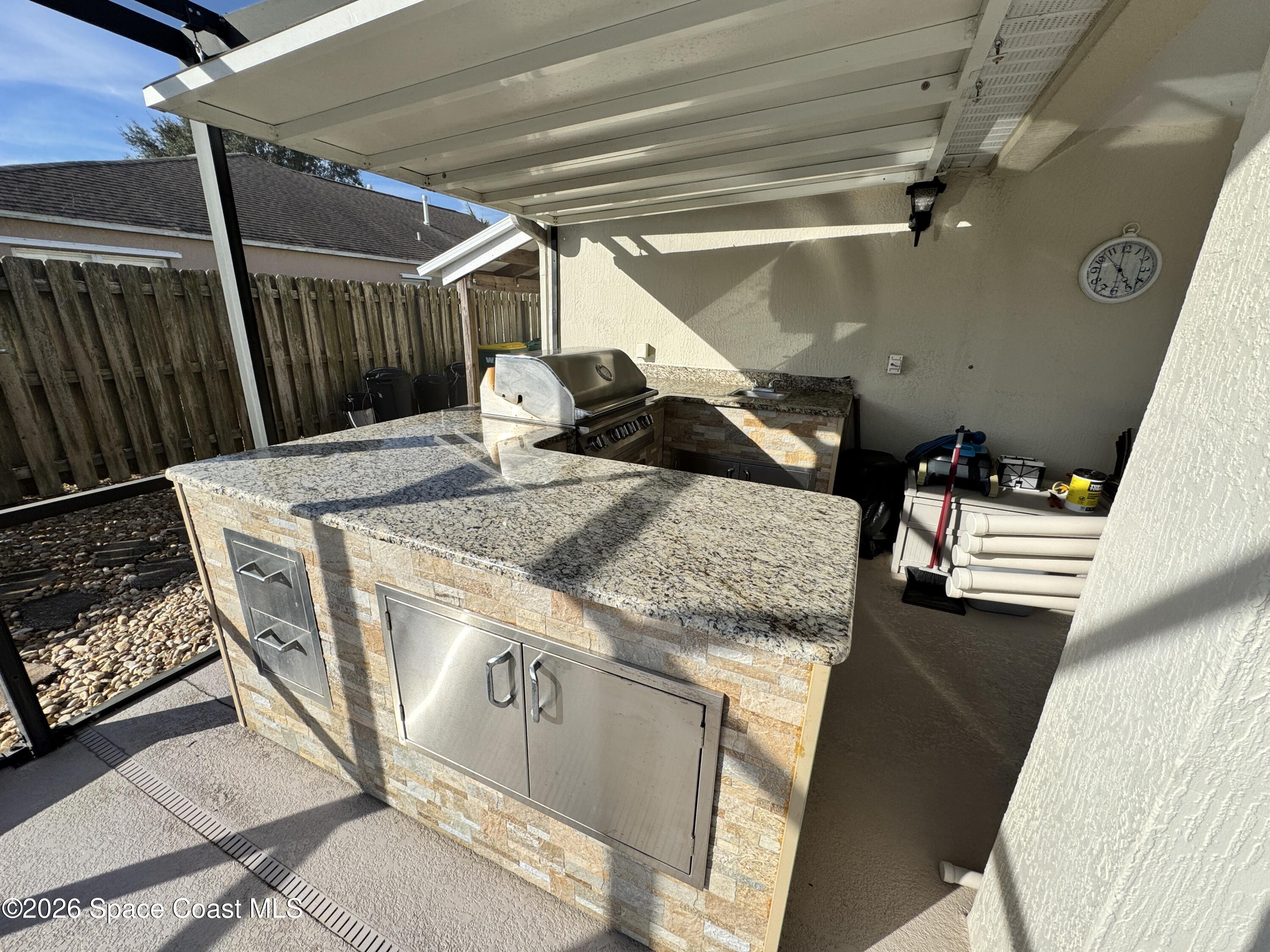 263 Mcclain Drive Melbourne, FL 32904 - Photo 11 of 56 Summer Kitchen 2