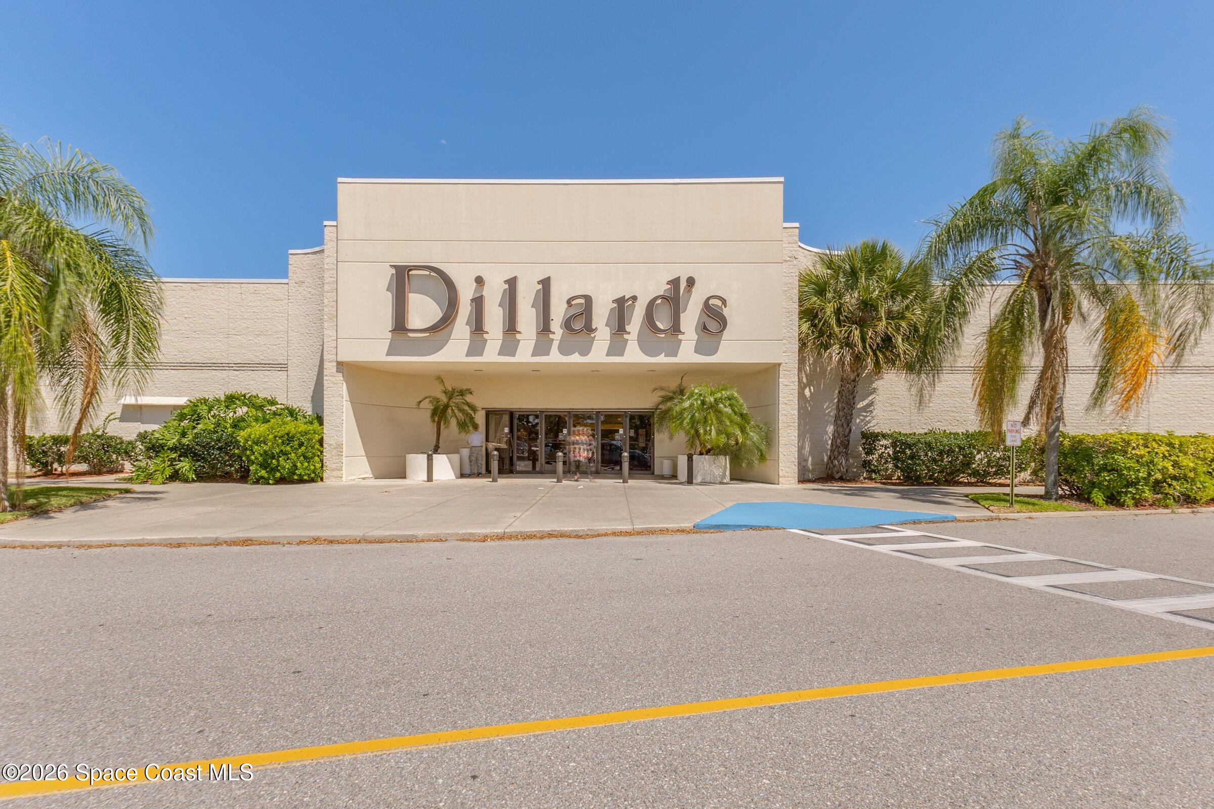 263 Mcclain Drive Melbourne, FL 32904 - Photo 43 of 56 a sign on a side of a building