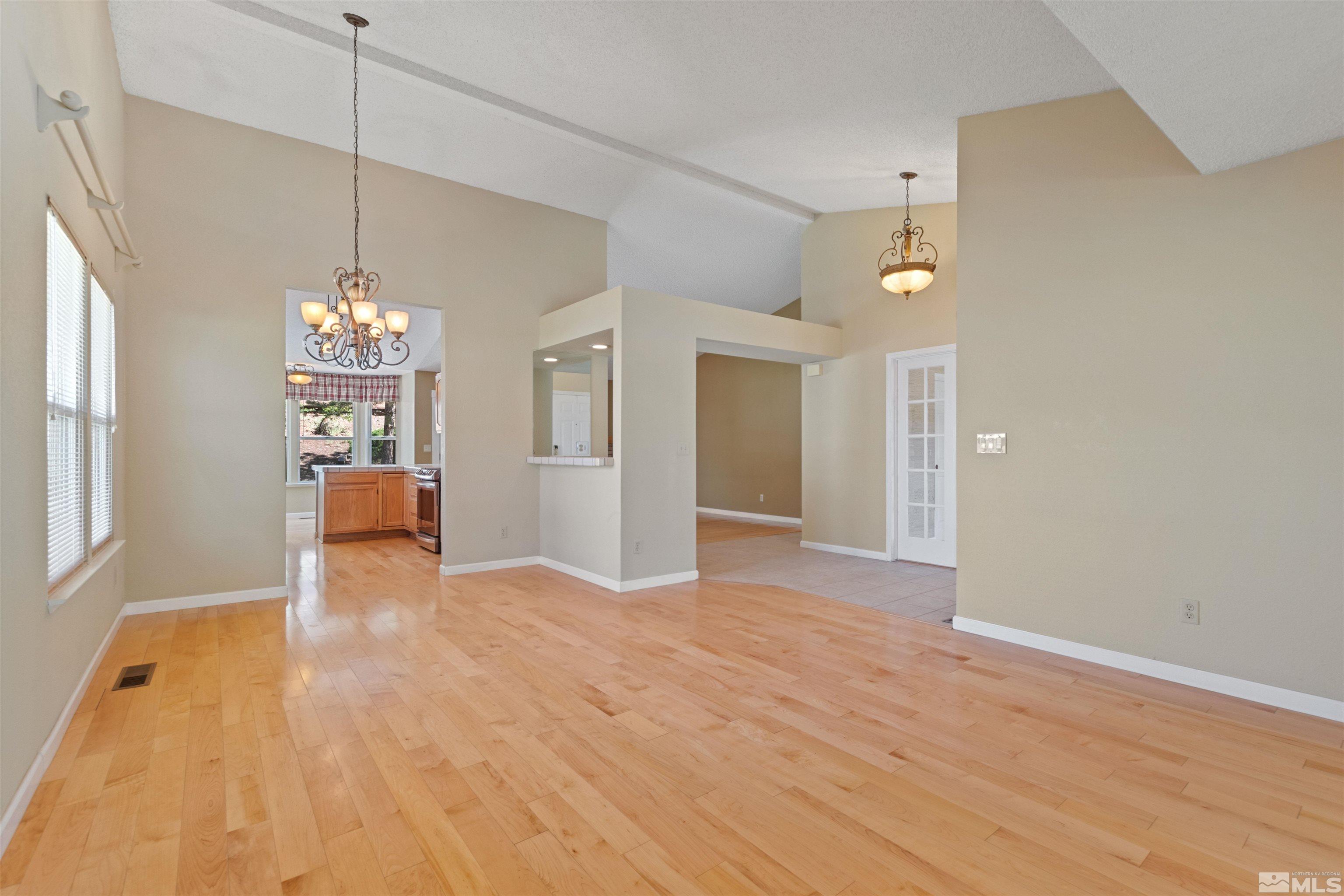 575 Cliff View Drive Reno, NV 89523 - Photo 11 of 33 a view of an empty room with kitchen and window